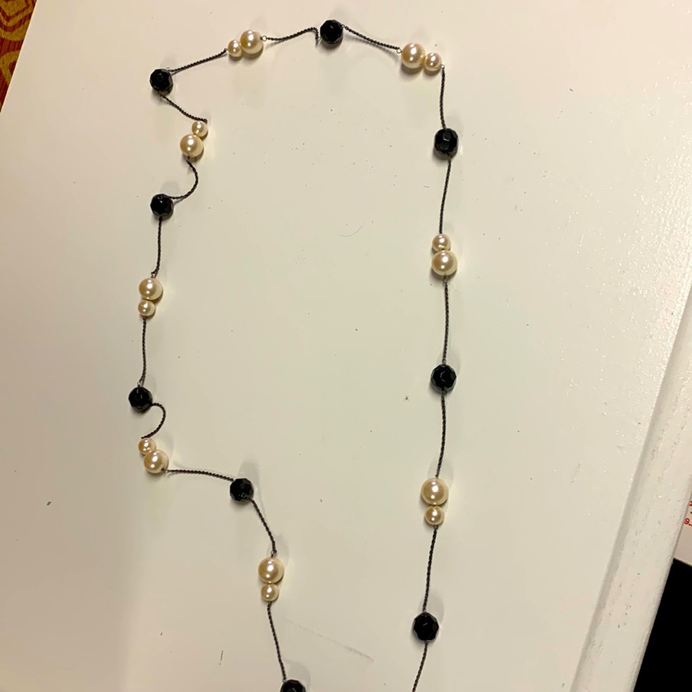 Long pearl like and black bead necklace